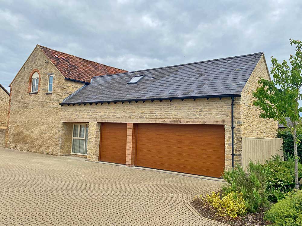 Beautiful garage extension in natural stone by trusted local building company